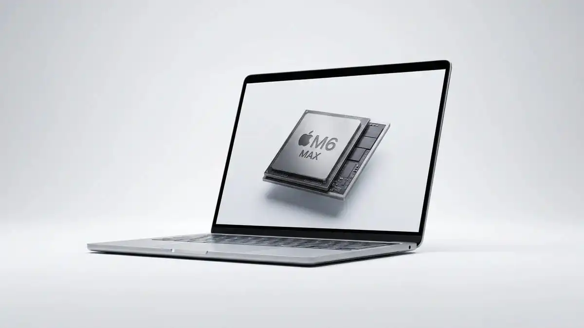 جهاز لابتوب حديث مفتوح يعرض مفهوم شريحة Apple M6 وتصميم MacBook Ultra بإضاءة استوديو نظيفة واحترافية